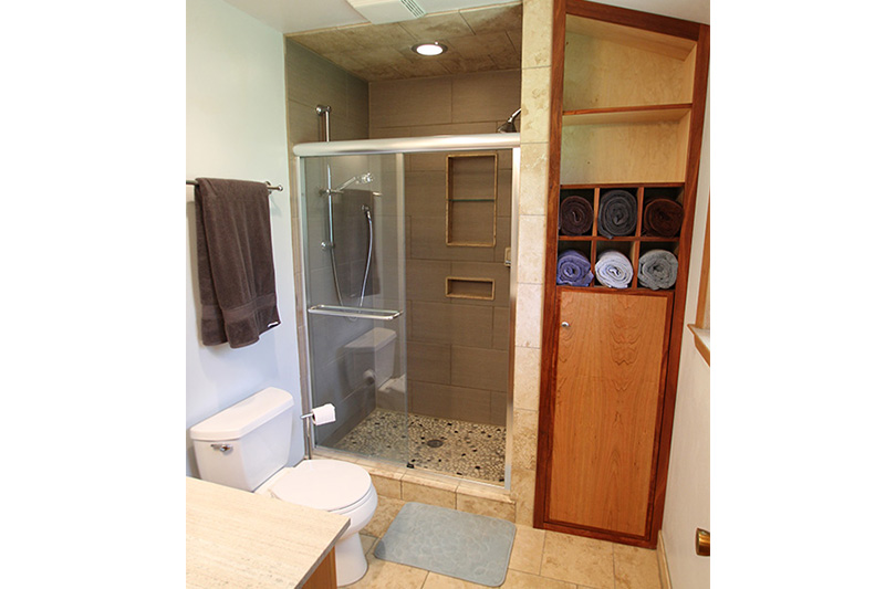 Brown Deer bathroom with travertine tile